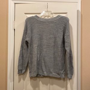 Sweater with cut out crossover back